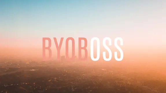 Sunset over Los Angeles with promo text "BYOBOSS".